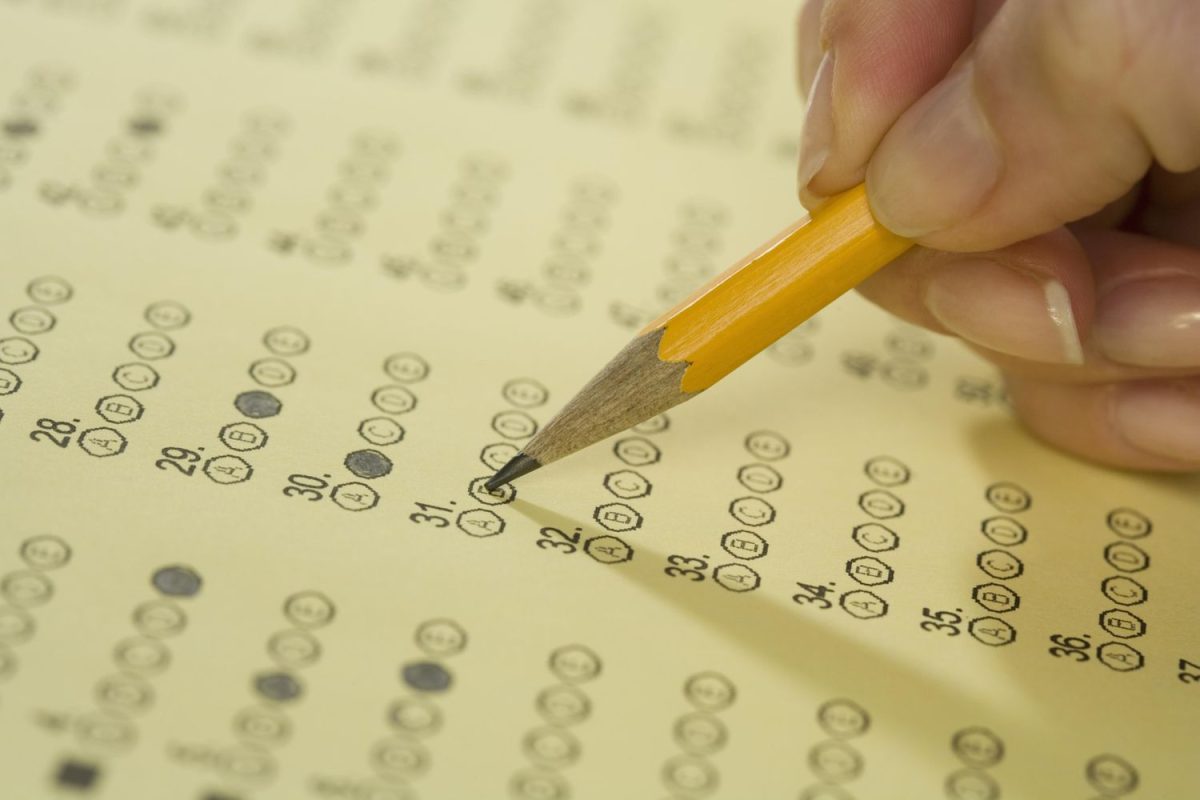 Student bubbling in answers on standardized test